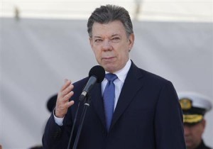Colombian President Santos gives a speech during a ceremony to mark the 94th anniversary of the Colombian Air Force at a military base in Bogota