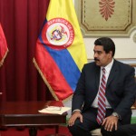 Maria Angela Holguin (L) and Nicolas Maduro (C)